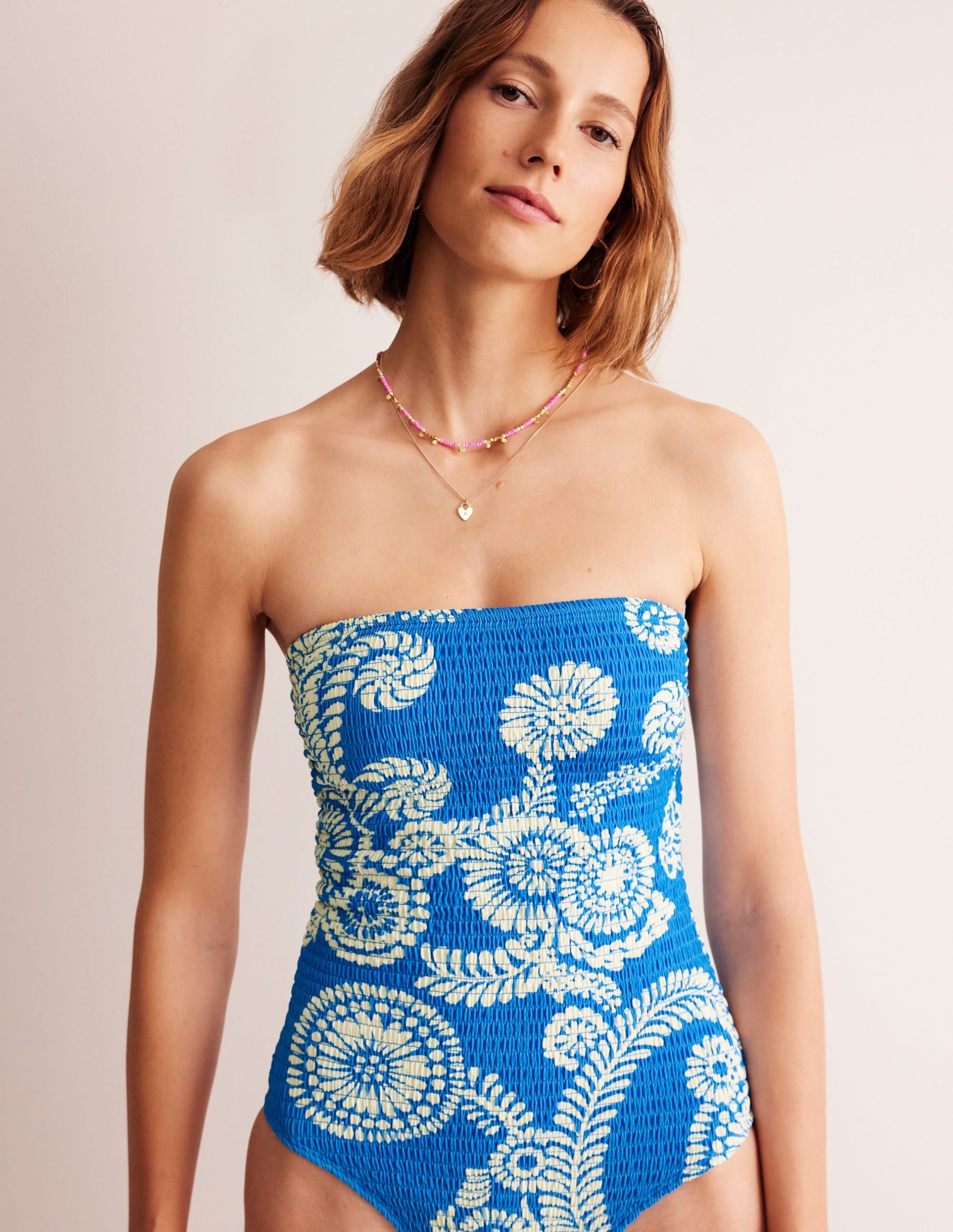 Milos Smocked Bandeau Swimsuit-Indigo Bunting. Abstract Charm